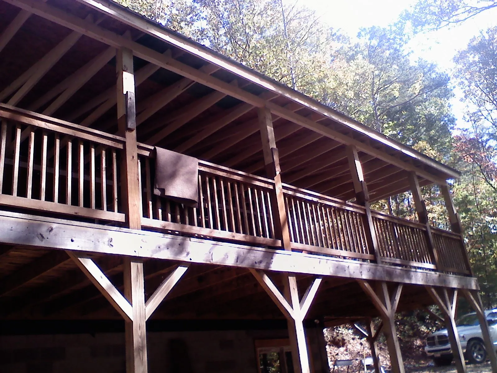 Timber framing under a new elevated porch and deck — Roof Leak Repair in Garrattsville by Roofing Brothers